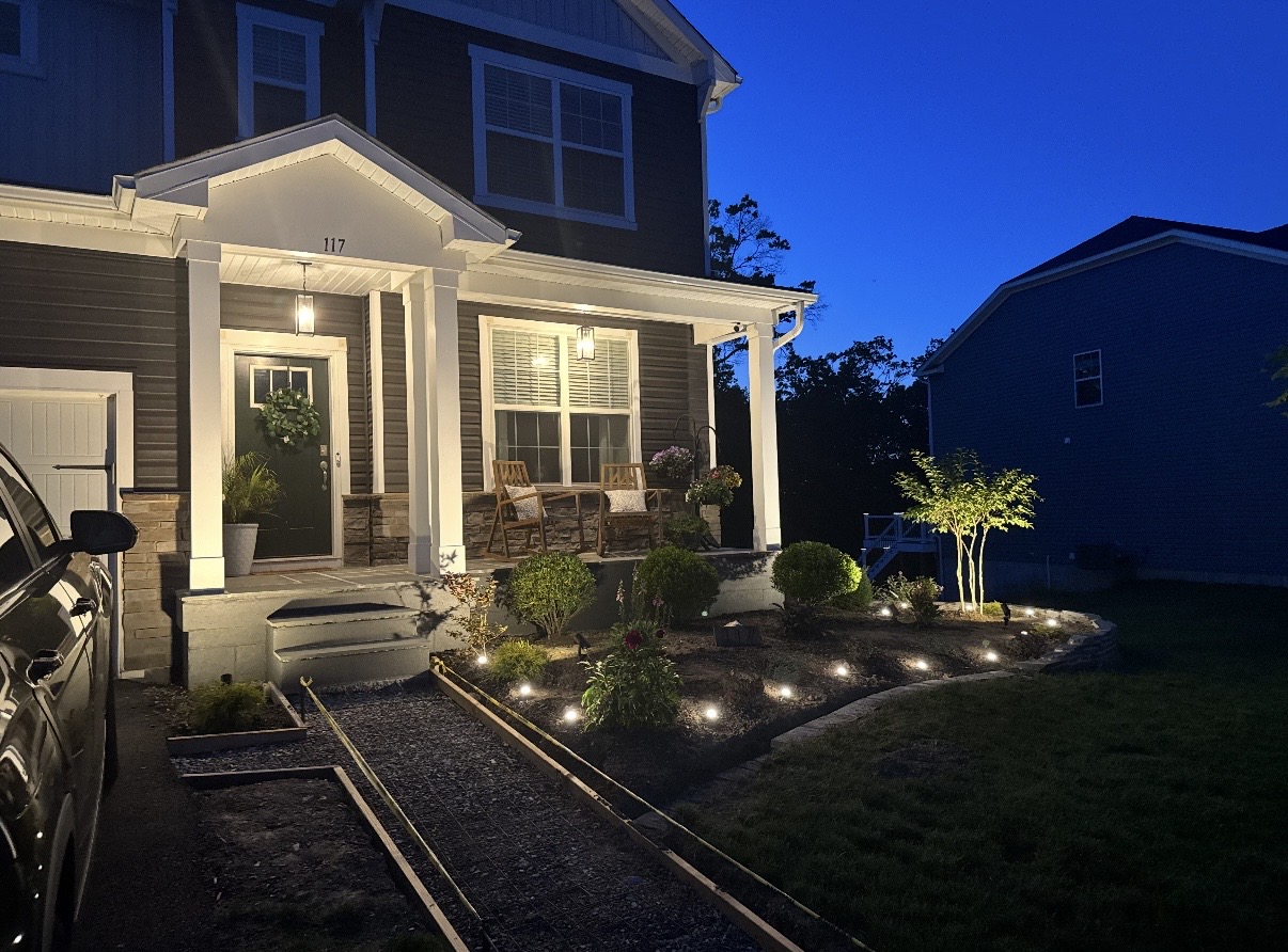 FullSizeRender 2 local concrete sidewalk and fully done garden with lights garden pathway